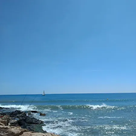 Lovely Beach With A Communal Roof Pool