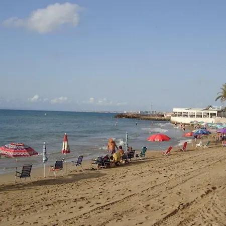 Lovely Beach With A Communal Roof Pool *